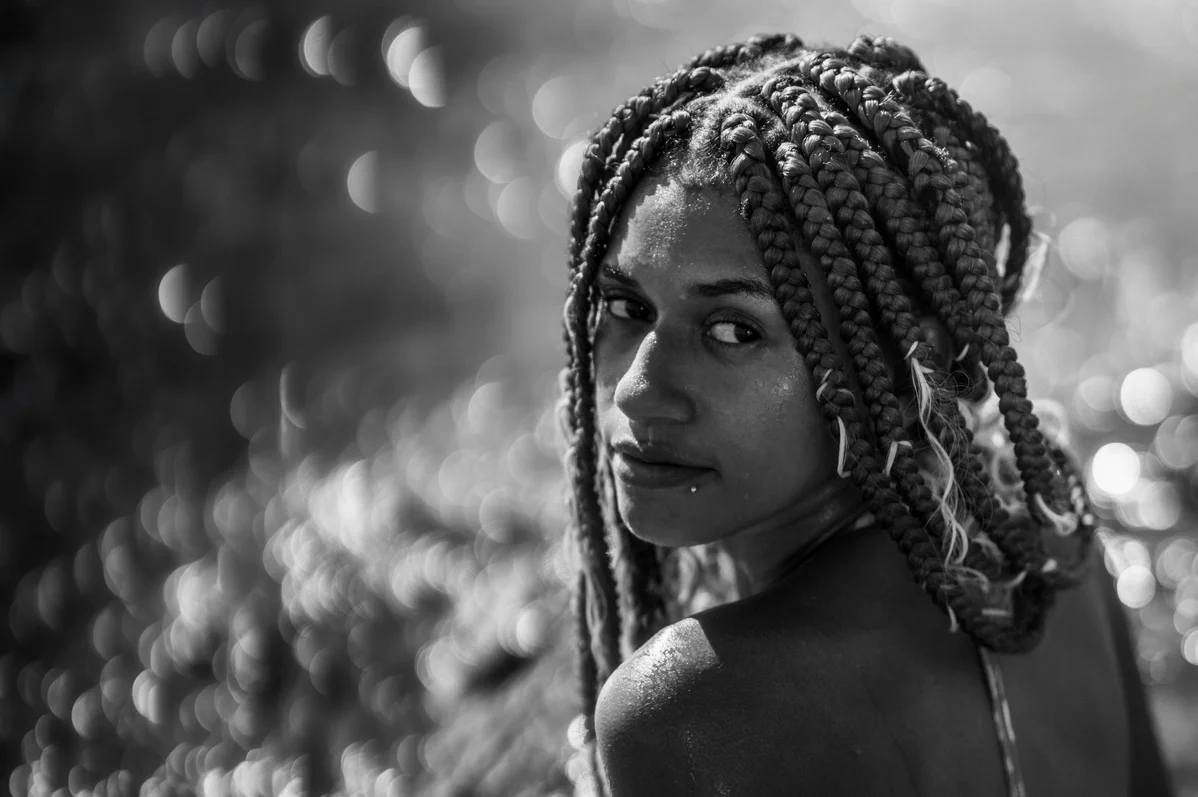 woman wearing protective braids for 4A hair woman wearing protective braids for 4A hair