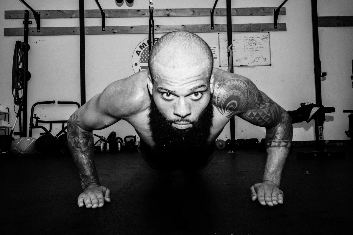 A close-up shot of a close-grip pushup in action showing proper form