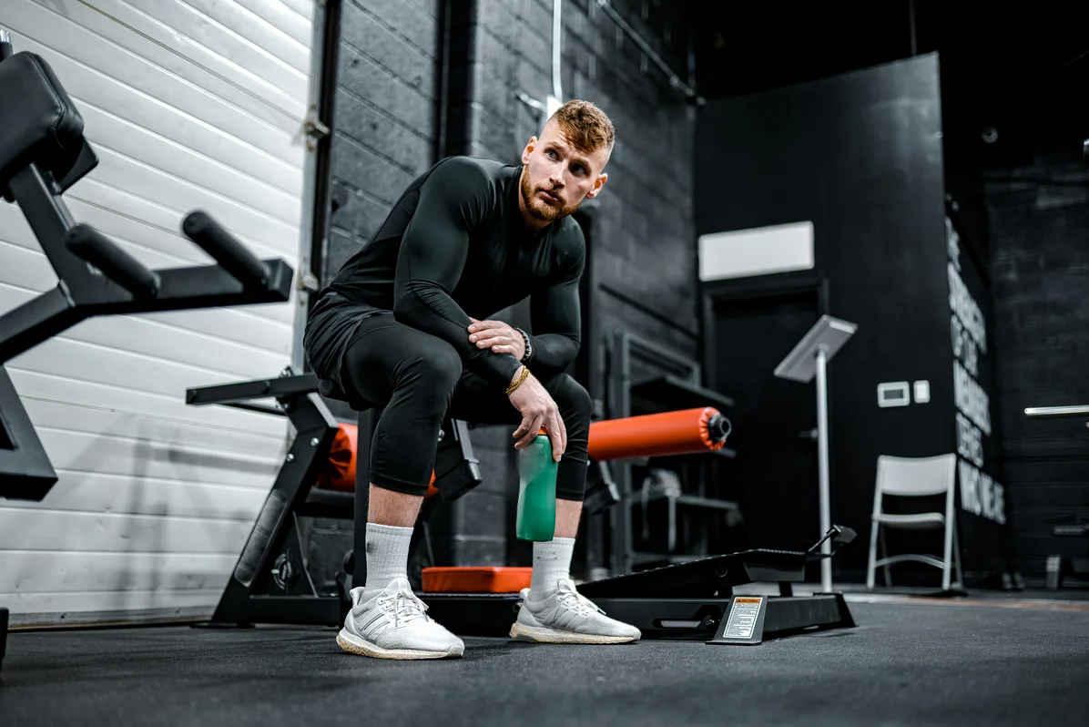 A person performing rehabilitation exercises on a mat for recovery A person performing rehabilitation exercises on a mat for recovery