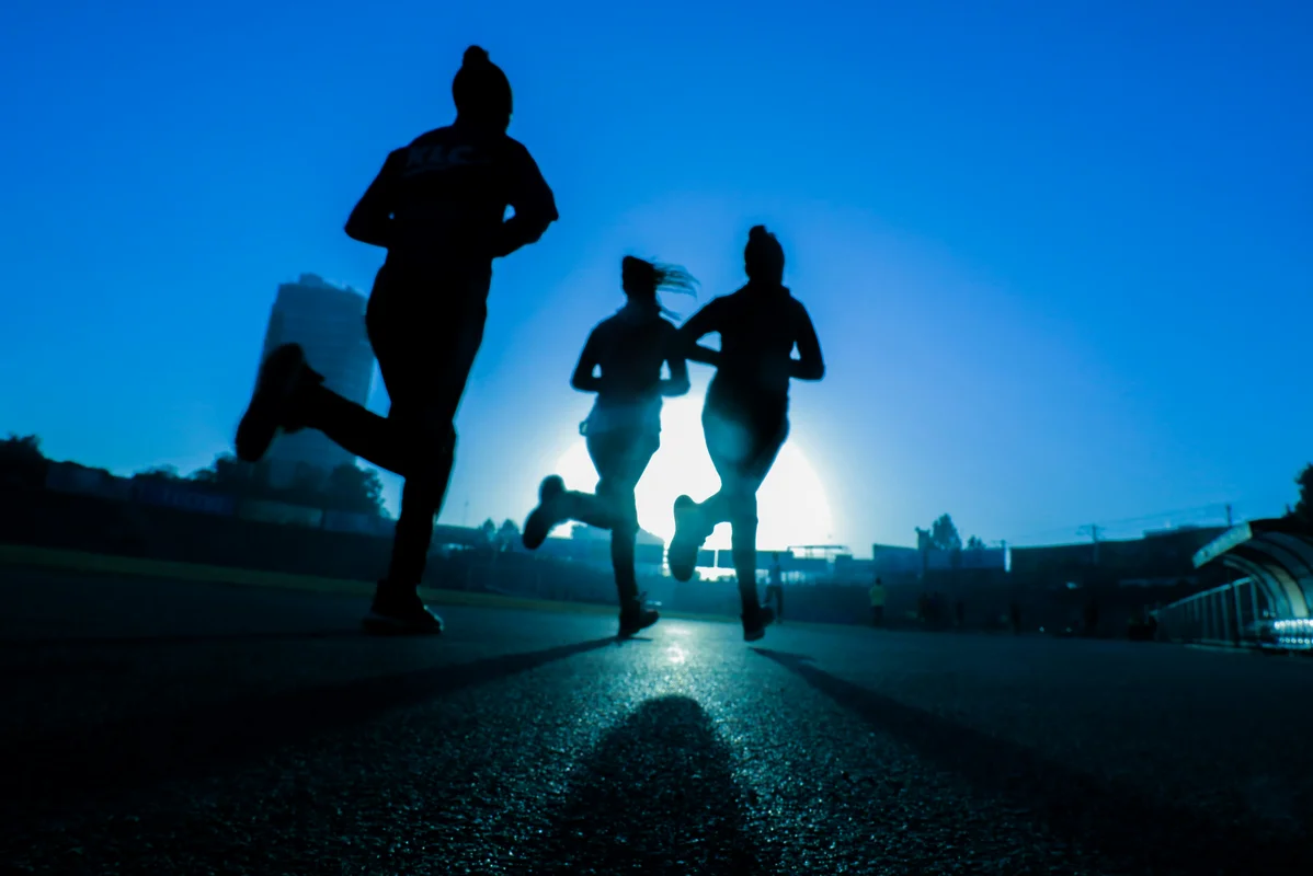 Runner practicing mental strategies during a long-distance run Runner practicing mental strategies during a long-distance run
