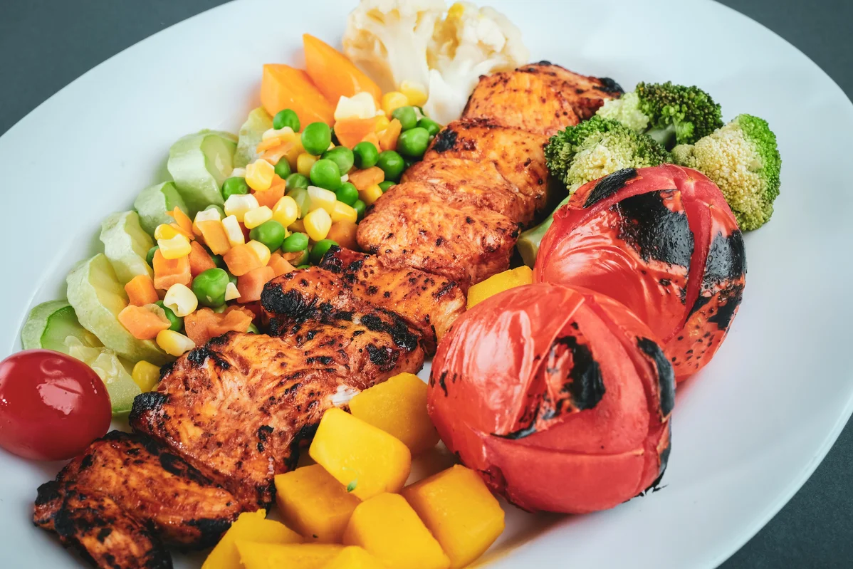 An assortment of protein and carb-rich foods like eggs and whole-grain bread An assortment of protein and carb-rich foods like eggs and whole-grain bread