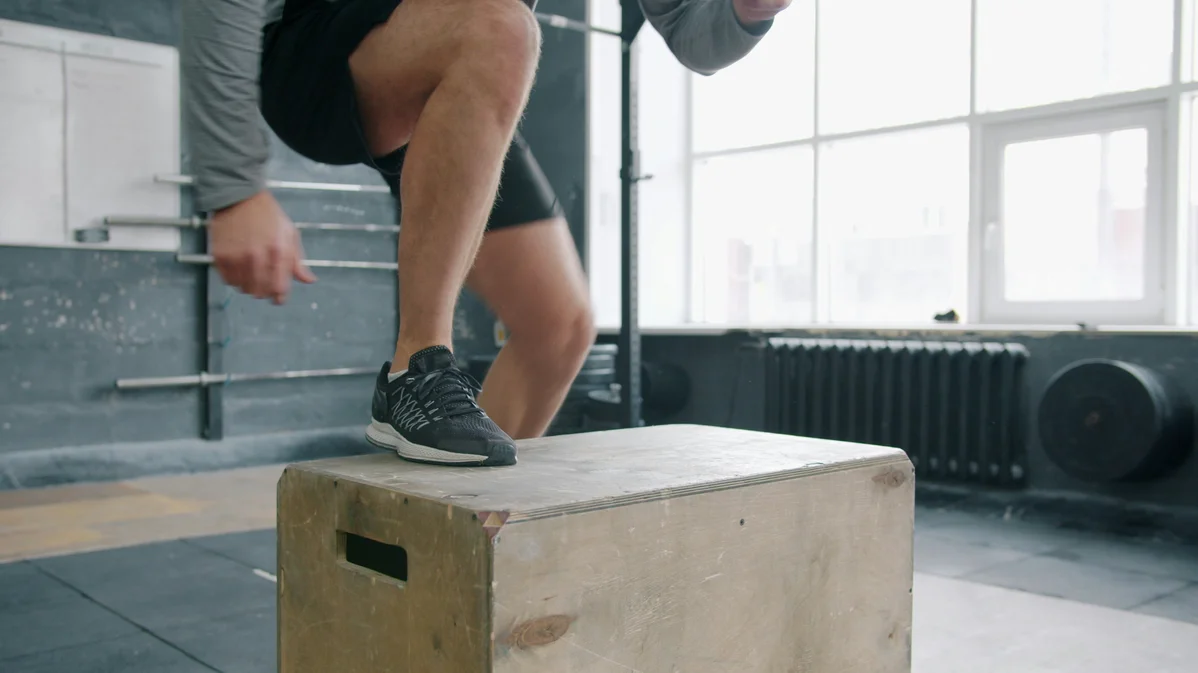 Demonstration of the forward step-down technique for fitness training