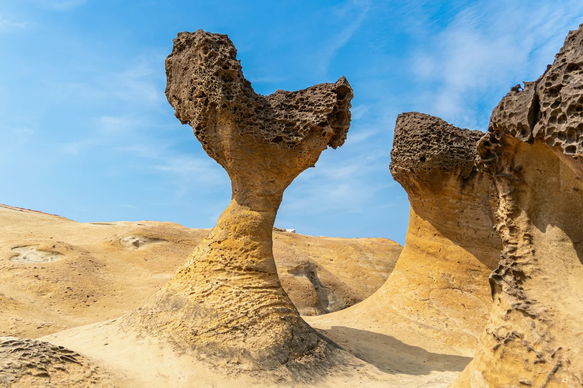 Unique geological formations in a geopark showcasing natural beauty and hiking trails Unique geological formations in a geopark showcasing natural beauty and hiking trails