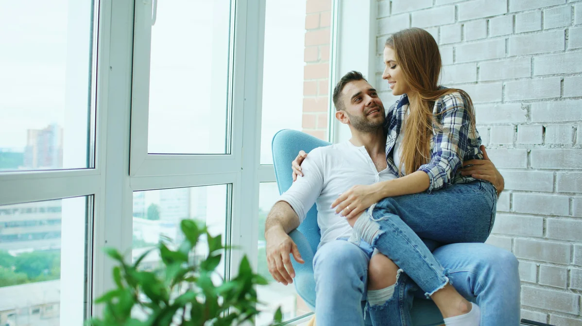 Couple enjoying an intimate moment together Couple enjoying an intimate moment together