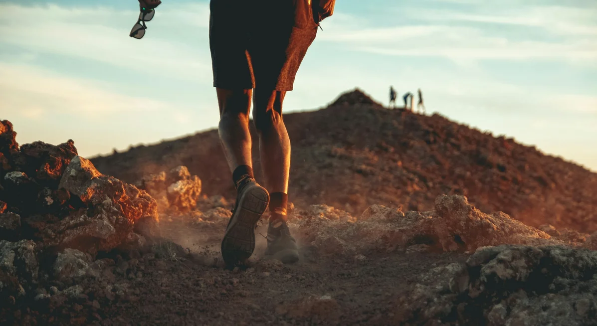 A runner focused and determined during training, illustrating mental strategies for success
