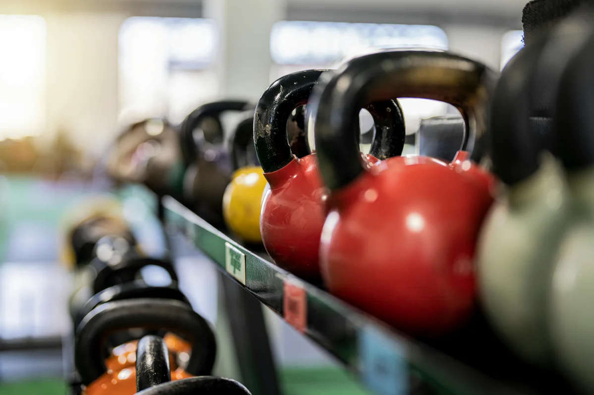 Kettlebell workout environment showcasing various kettlebell exercises