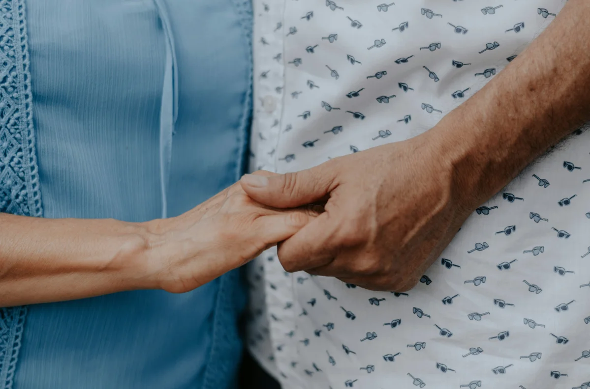A nurse providing emotional support to a cancer patient A nurse providing emotional support to a cancer patient