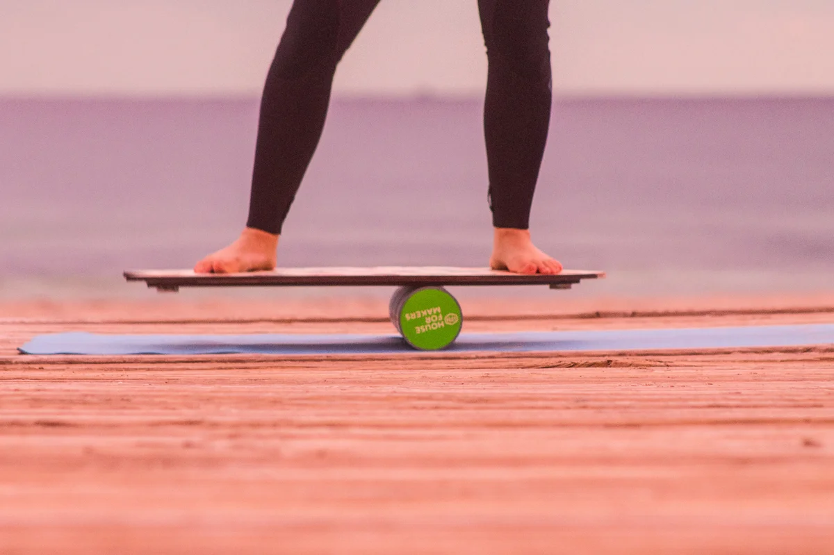 A stability ball and balance board used for training balance