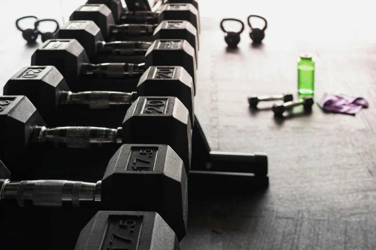 Dumbbells ready for strength exercises to prevent muscle loss Dumbbells ready for strength exercises to prevent muscle loss