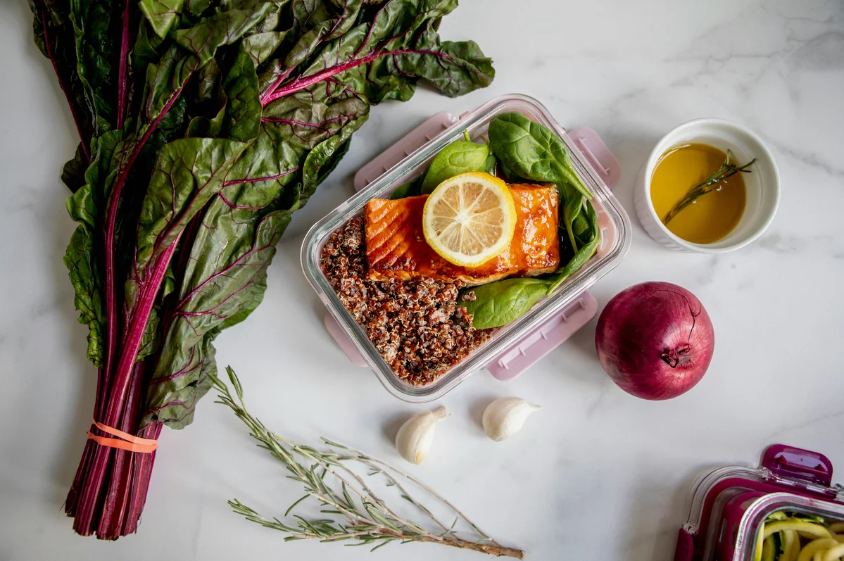 Healthy meal prep containers filled with nutritious ingredients Healthy meal prep containers filled with nutritious ingredients